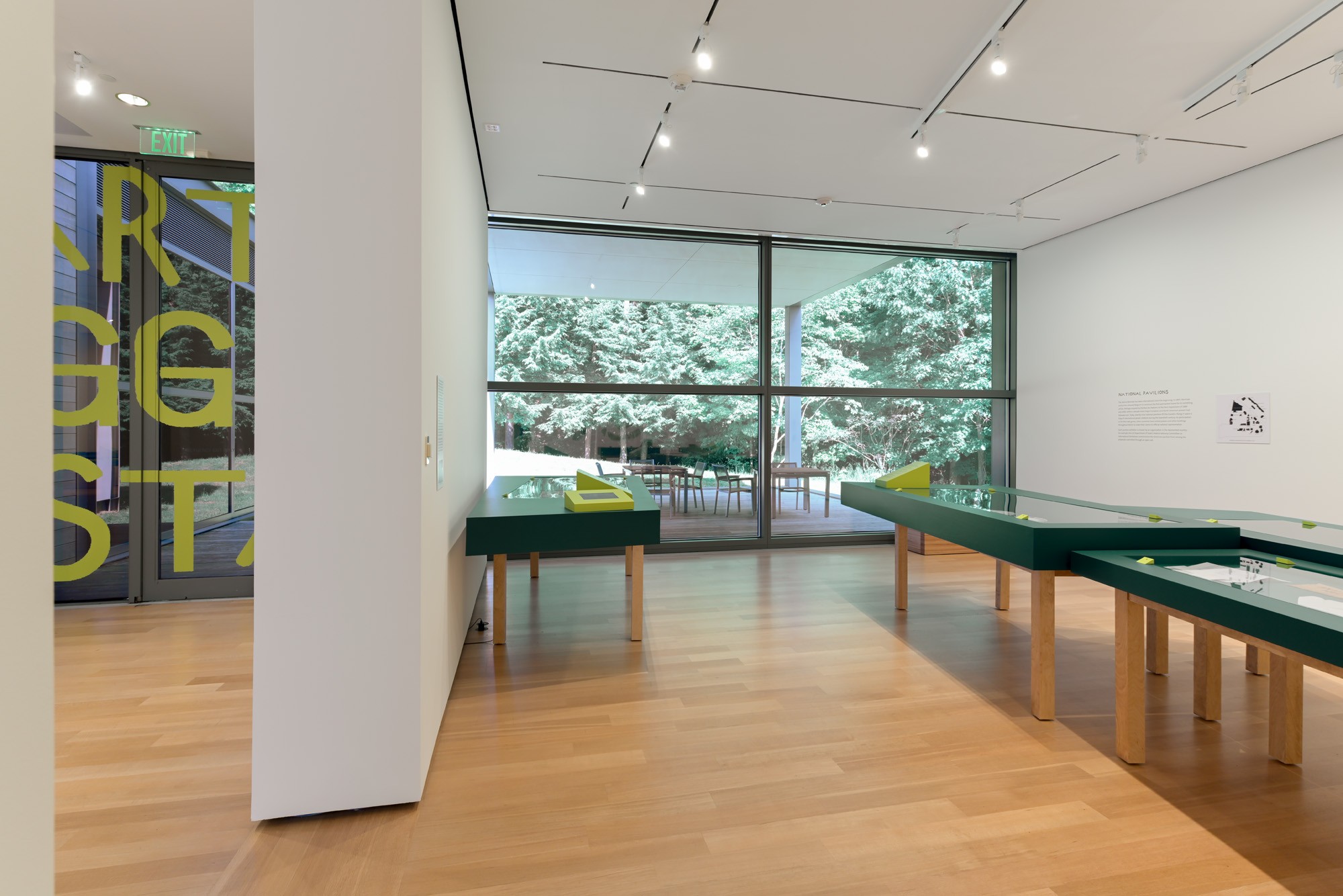 A view of the title wall and cases from the exhibition